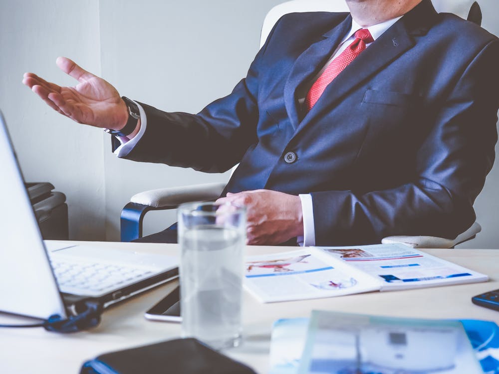 a man in an office suit